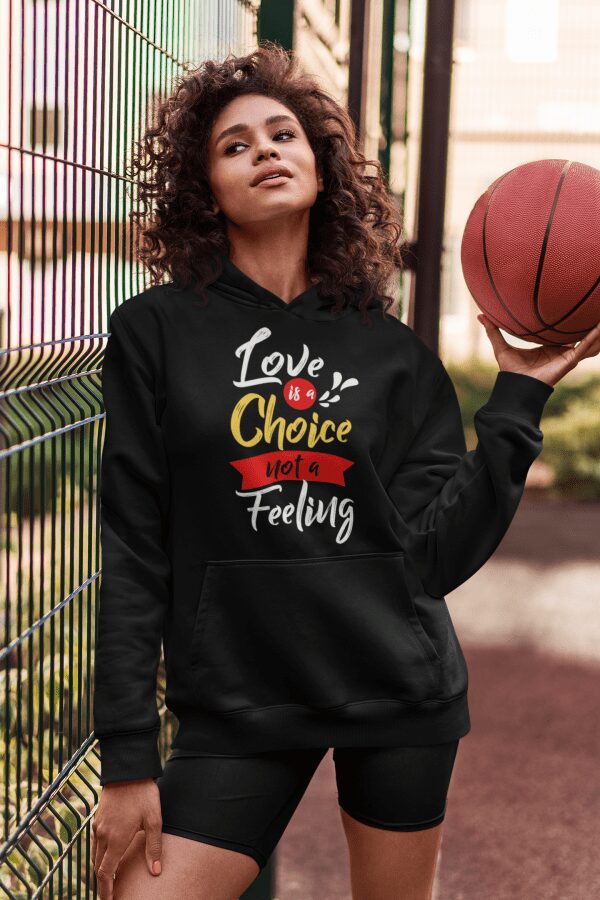 Love is a Choice Unisex Sweatshirt - hoodie mockup featuring a woman with a basketball el - Shujaa Designs