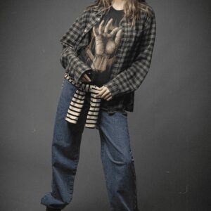 Guitar Hand Unisex Jersey Short Sleeve Tee - grunge styled mockup featuring a serious woman wearing a bella canvas t shirt m - Shujaa Designs